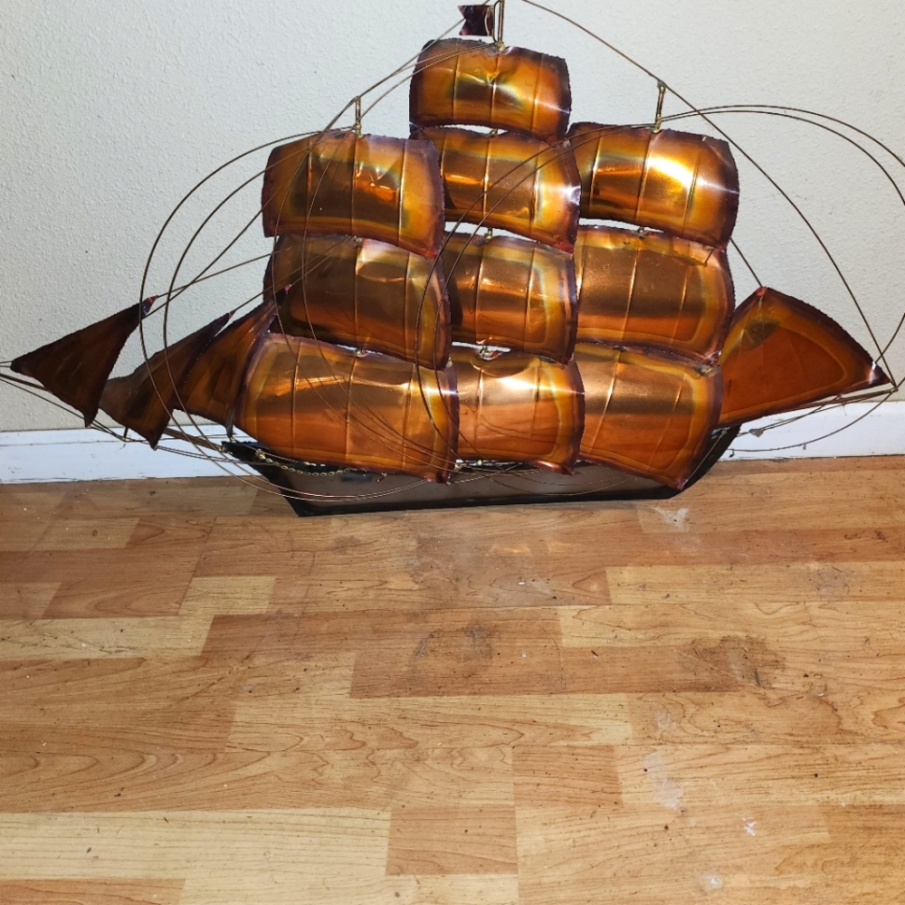 Copper ship wall art